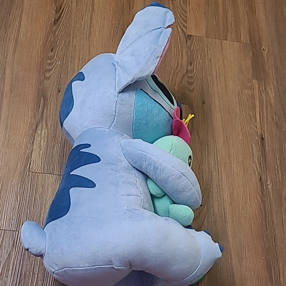 Disney Blue and‎ Pink Stitch Plush with Green Doll used good condition.